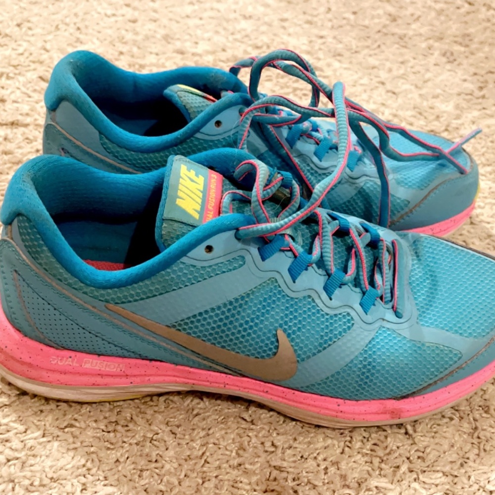 Blue and pink Nike sneakers